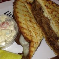 Peter Luger Panini · Roast beef with grilled onions, melted Mozzarella cheese, peter luger sauce;