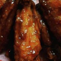 Buffalo Wings (10Pc) · Plain or tossed, choice of dipping sauces.