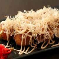 Takoyaki (6 Pcs) · Octopus-balls with batter (wheat flour base), traditional Japanese sauce.