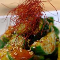 Spicy Cucumber (Vegetarian) · Cucumber, sesame seeds with spicy sauce.