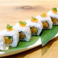 Sushi Roll - Spicy Salmon Roll · Raw salmon with sushi rice, homemade spicy sauce.