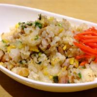 Pork Fried Rice · Fried rice with char siu pork, onion, leek, scallion and egg.