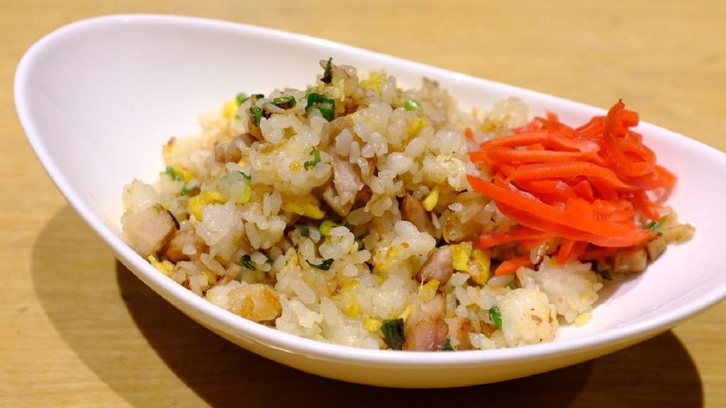 Pork Fried Rice · Fried rice with char siu pork, onion, leek, scallion and egg.