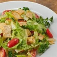 Caesar Salad · Romaine lettuce, grape tomatoes, purple onions, Parmesan cheese, low-fat caesar dressing.