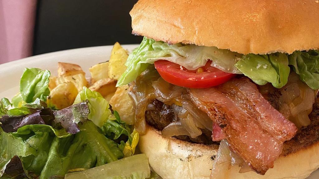 Wagyu Beef Burger · With Cheddar Cheese, Onion al Balsamico, Tomato, Lettuce served with Roasted Potato & Greens