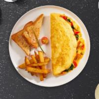Vegetable Omelette · Eggs, tomatoes, onions, peppers, mushrooms, and broccoli  as an omelette. Served with home f...
