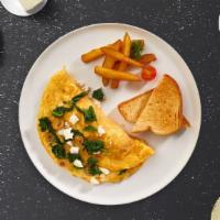 Greek Omelette · Eggs cooked with feta cheese, olives, tomatoes, onions, and peppers as an omelette. Served w...