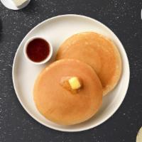 Classic Buttermilk Pancakes · Fluffy pancakes cooked with care and love served with butter and maple syrup.