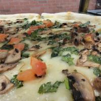 Romano Ranch Pizza · Spinach, mushrooms, tomatoes, mozzarella & our own ranch sauce.