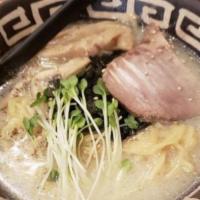 Shio Ramen · Salt ramen with chicken broth, cha-shu (pork), radish sprouts, roasted seaweed, and sesame s...