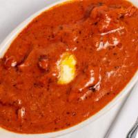 Chicken Makhani · Boneless chicken cooked in a rich tomatoes based cream and butter sauce delicately spiced wi...