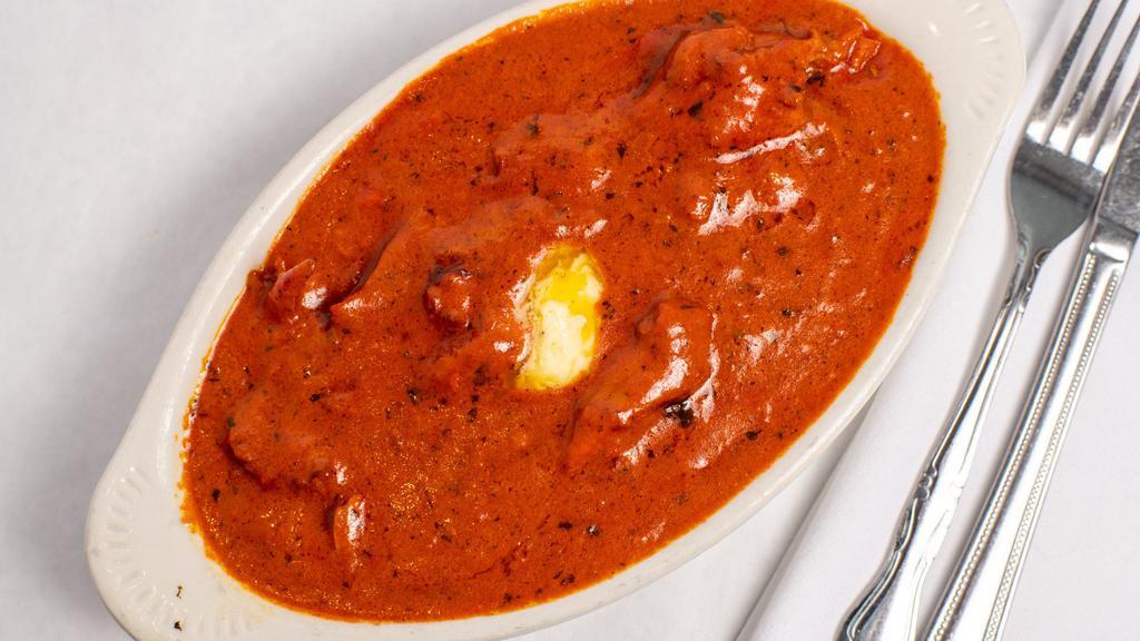 Chicken Makhani · Boneless chicken cooked in a rich tomatoes based cream and butter sauce delicately spiced with herbs.
