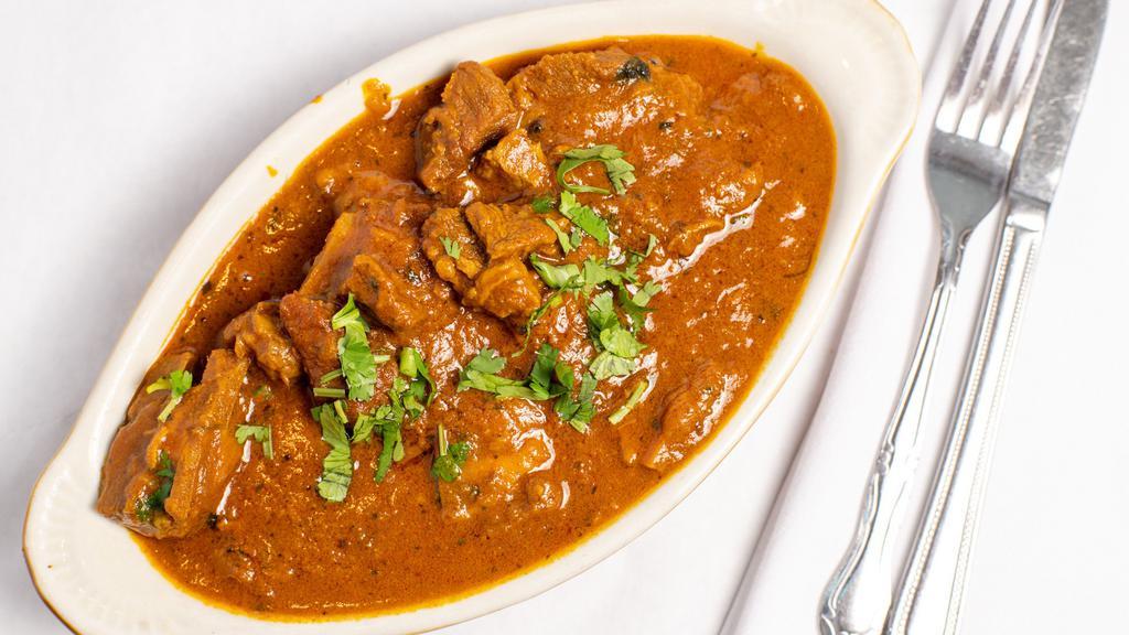 Goat Curry · Fresh goat exotically prepared in a traditional Indian curry with herbs and spices.