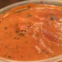 Paneer Makhani · Paneer cooked in a rich tomato based cream and butter sauce delicately spiced with herbs. Ve...