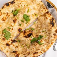 Garlic Naan · Bread stuffed with garlic and baked in tandoor. Homemade Indian bread.