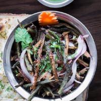 Bhindi Karari · Crispy fried Okra tossed with onion/tomatoes /lemon juice and chat masala and served with Ba...
