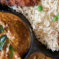 Lamb Madras · Lamb in tomato coconut gravy tempered with curry leaves, red chili, and served with white ri...