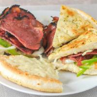Hot Pastrami Sandwich · Oven hot pastrami, onions, green peppers, and melted Provolone cheese.