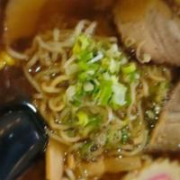 Miso Ramen · Miso based soup with fish cake, sliced pork, corn, bamboo shoots and scallions.
