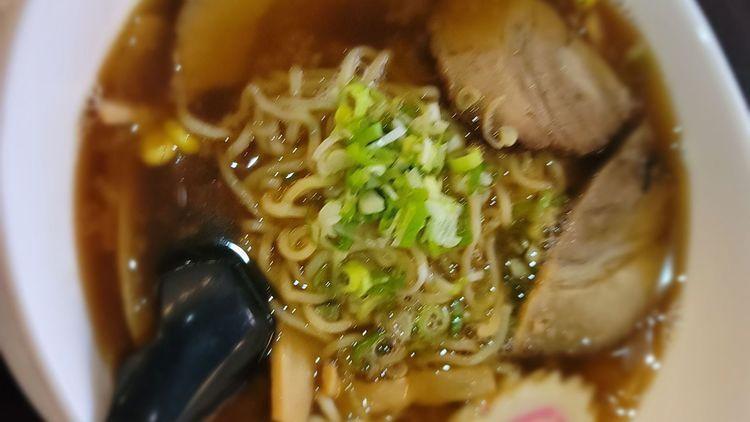 Miso Ramen · Miso based soup with fish cake, sliced pork, corn, bamboo shoots and scallions.