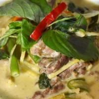 Green Curry · Hot. Coconut milk, bamboo shoots, mixed vegetables, basil leaves and chili pepper. Served wi...