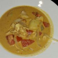 Yellow Curry · Hot. Coconut milk, potatoes, onions, tomatoes and peanuts. Served with white rice or brown r...