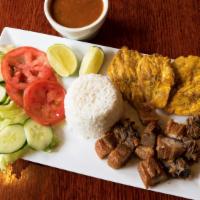 Pork Pieces / Chicharron De Cerdo · with rice and beans, plantains, and choice of salad or vegetables / con arroz y habichuelas,...