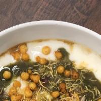 Samosa Chaat · Layers of flavor with warm chickpea stew, sweet refreshing yogurt, garlic cilantro and date ...