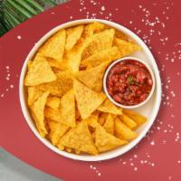 Salsa & Chips · Warm up with toasty corn tortilla chips served with a side of tangy salsa.