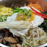 Beef Bibimbop / 소고기 비빔밥 · Marinated beef over rice.🌶️