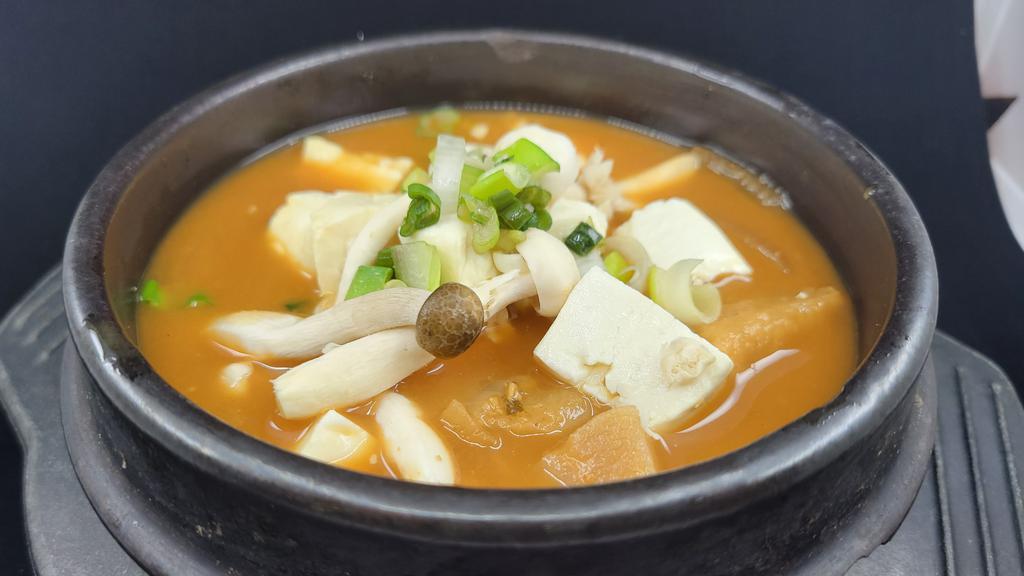Dwenjang Jjigae / 된장찌개 · Bean paste stew with choice of pork or Beef option, comes with rice and kimchi.