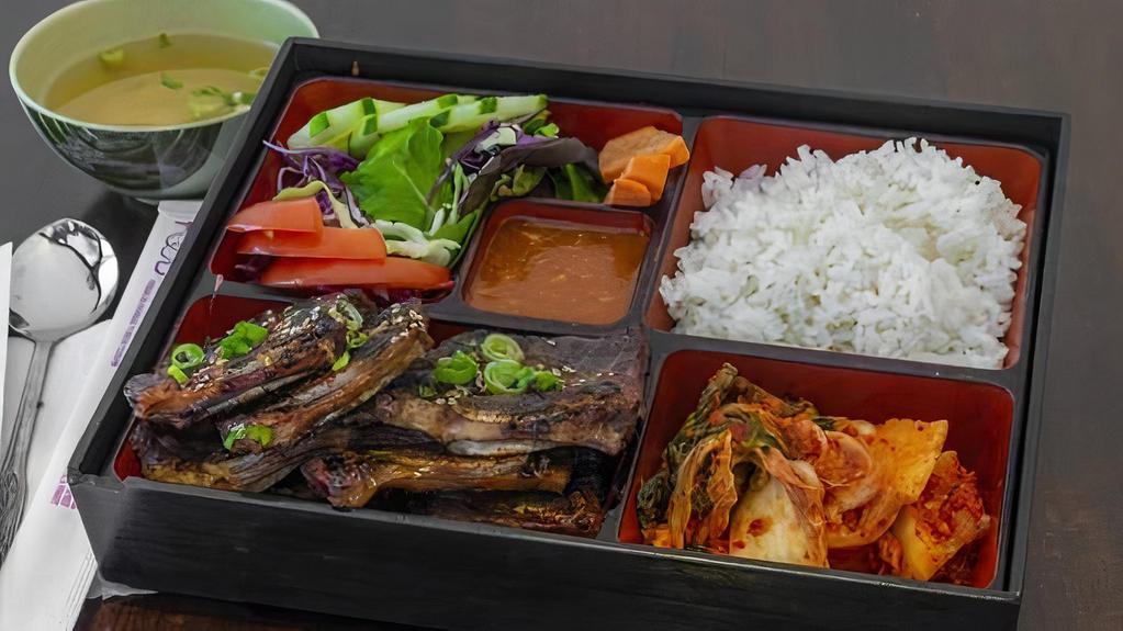 Bbq Beef Rib / 바베큐 갈비 · Korean BBQ beef short rib. Comes with rice,salad, and kimchi.