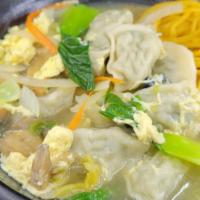Wonton Noodle Soup / 완탕 누들슾 · Noodle soup with pork dumplings.