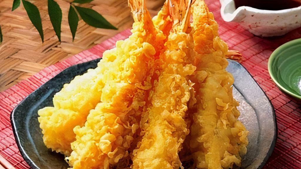 Shrimp Tempura / 새우튀김 · Four pcs of fried shrimp.