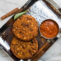 Masala Dal Vada (Vgf) · Crispy lentil patties served with a tomato chutney. Vegan & Gluten Free.