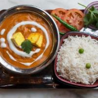 Paneer Tikka Masala (Gf)  + Rice · Grilled panner with peppers and onions in a cashew curry sauce served with rice. Gluten Free.