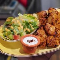 Chicken Shish · Skewed marinated cubes of chicken breast char-grilled to perfection