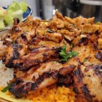 Chicken Chops · Char-grilled boneless chicken thigh marinated with yogurt, pepper & herbs