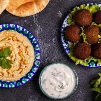 Falafel +Hummus Dinner +1Pt · Seven deep fried balls of chickpea puree with tahini and Hummus Served with Pita/ 1PC