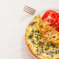 Mushroom Omelet · Fluffy, buttery three egg omelet with soft, fresh mozzarella cheese and mushrooms, made to o...