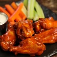 Wings - Boneless · 8 traditional bone in or boneless wings tossed in your choice of sauce, Served with celery, ...