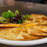 Cheese Quesadilla · Melted cheddar cheese in a flour tortilla