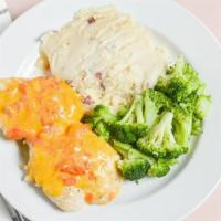 Cheddar Chicken Dinner · Two grilled chicken breasts with diced tomato and melted cheddar cheese. Served with fries a...