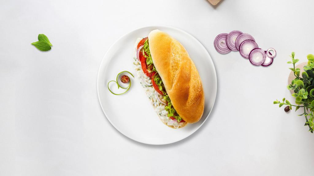 Tuna Salad Sandwich · Fresh tuna salad with cheese, lettuce, and tomato. Served on your choice of bread.