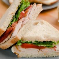 Turkey Sandwich · Turkey with cheese, lettuce, and tomato. Served on your choice of bread.
