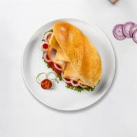 Pepper Turkey Sandwich · Pepper turkey with cheese, lettuce, and tomato. Served on your choice of bread.