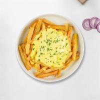 Cheese Fries · Idaho potato fries cooked until golden brown & garnished with salt, garlic, and cheese.