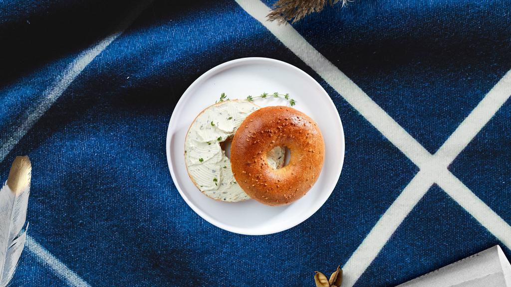 Scallion Scene Bagel · Toasted bagel topped with scallion cream cheese.