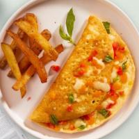 Western Omelette Platter · Scrambled eggs cooked with turkey ham, bell peppers, onions, and American cheese as an omele...