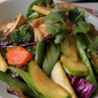 Buddha'S Feast · Fried tofu, mushrooms, carrots, broccoli, cabbages, green beans, zucchini, and baby corn tos...
